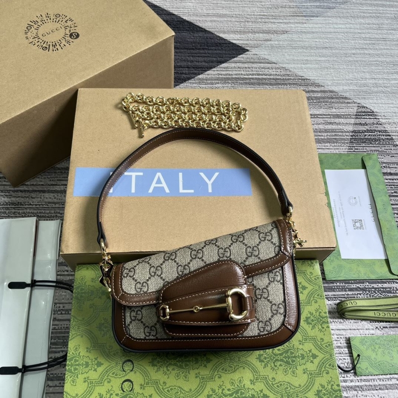 G*u*i top handle bags